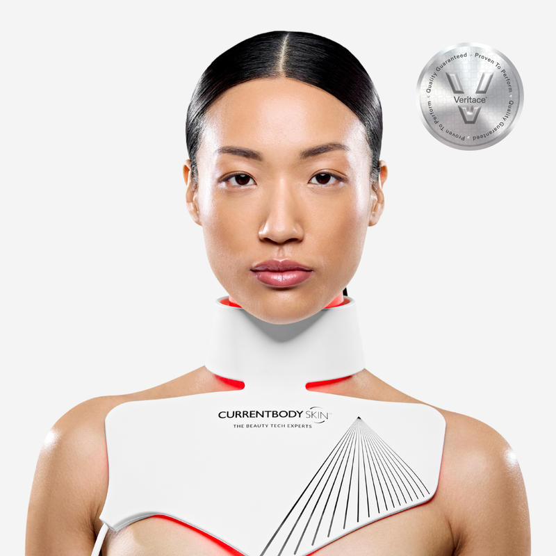 Woman wearing CurrentBody LED Neck & Décolletage Mask - Series 2 for anti-ageing red light therapy treatment