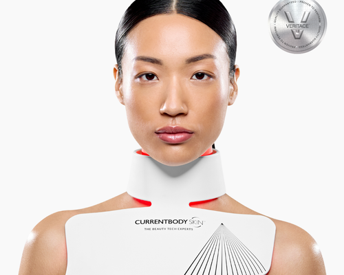 woman with neck and chest anti-ageing device on