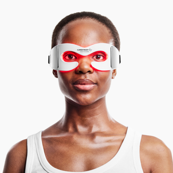 Woman facing forward wearing LED Eye Mask
