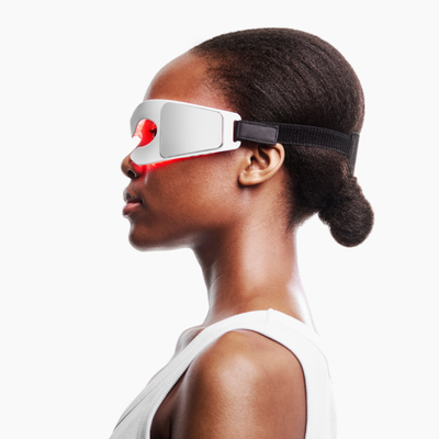 Woman wearing LED Mask facing sidewards