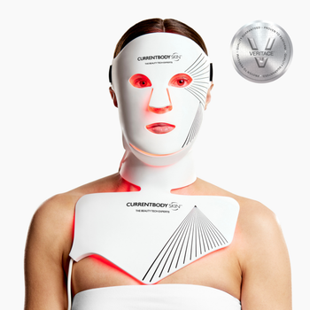 Woman facing forward wearing the LED Face & Neck Mask